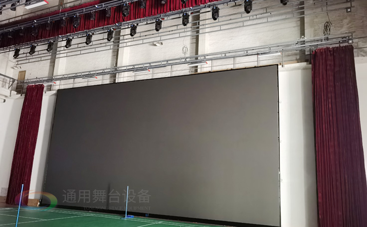 廣州黃花崗禮堂選擇通用舞臺！禮堂舞臺阻燃幕布、吊桿、舞臺燈光項目圓滿竣工！